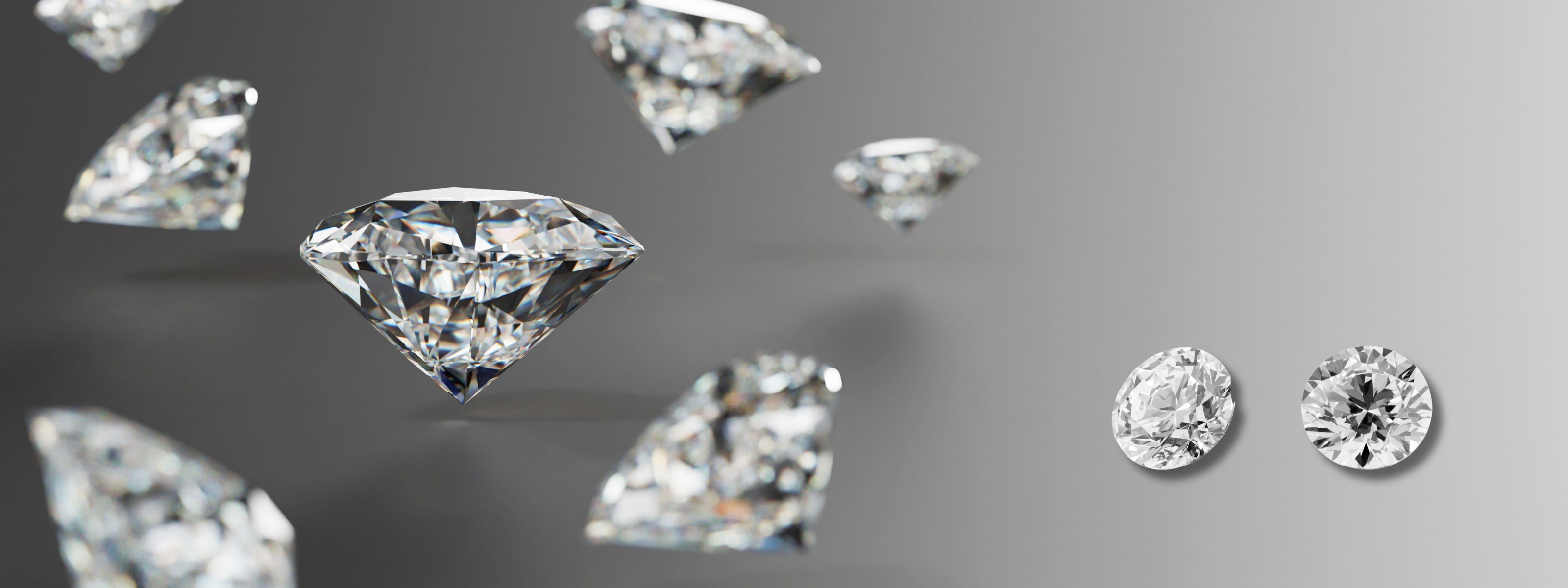 Diamonds in different carat sizes and brilliant cuts displayed in a minimal setting